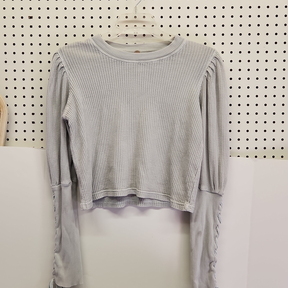Free people waffle shirt women's size xs great condition.  Lace up long sleeves